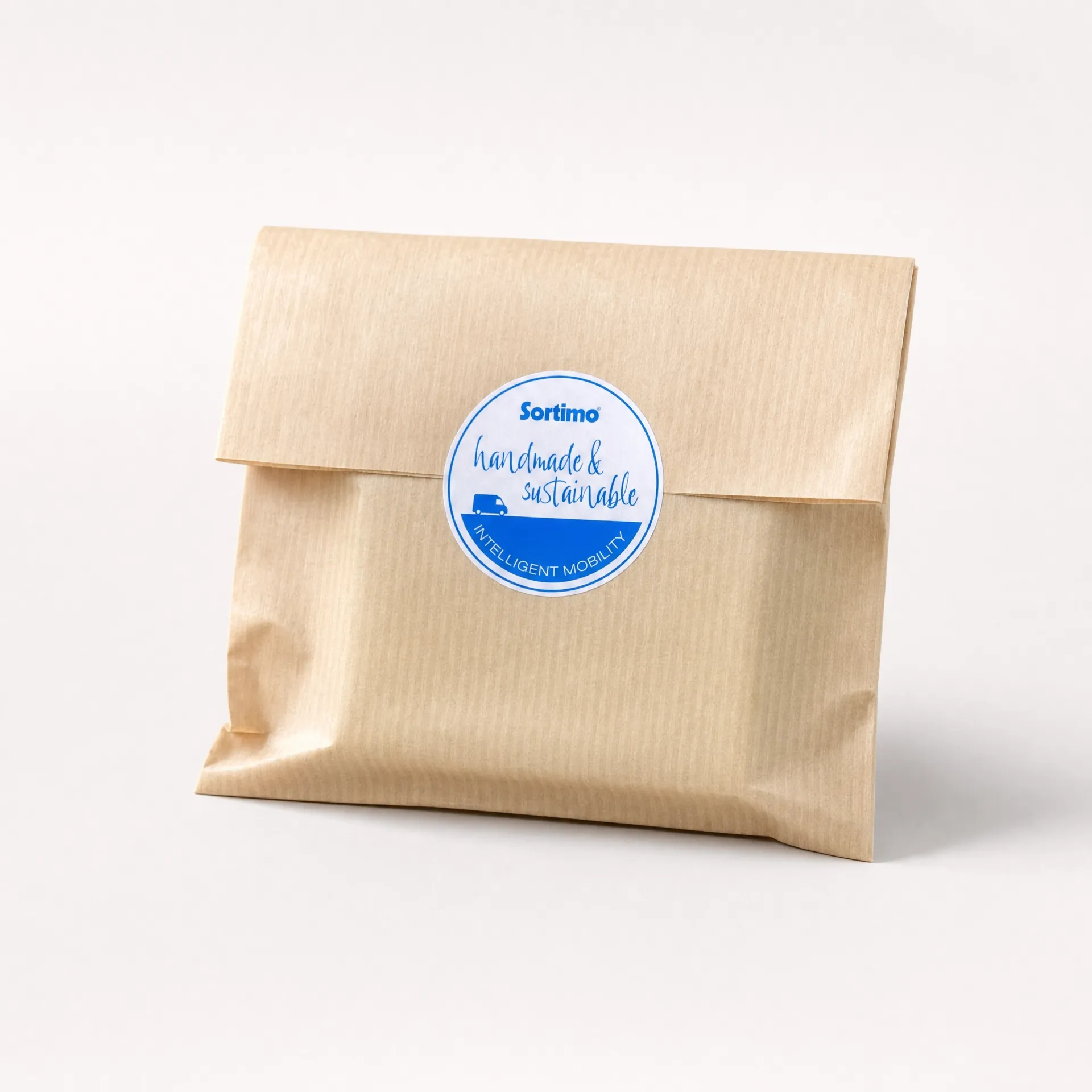 Seifenstück in umweltfreundlichem Kraftpapier mit individuellem Sortimo-Branding-Sticker